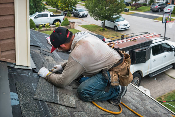 Professional Gutter Installation technician working in Grass Lake, MI